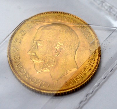 Lot 208 - A George V gold half sovereign, and other coinage.