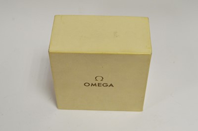 Lot 422 - Omega: a 9ct yellow gold cased manual wind wristwatch, and boxes