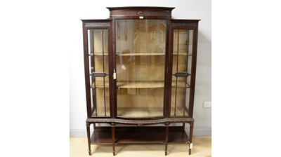 Lot 32 - Sopwith & Co., Newcastle upon Tyne: an early 20th C fine quality bowfront display cabinet.