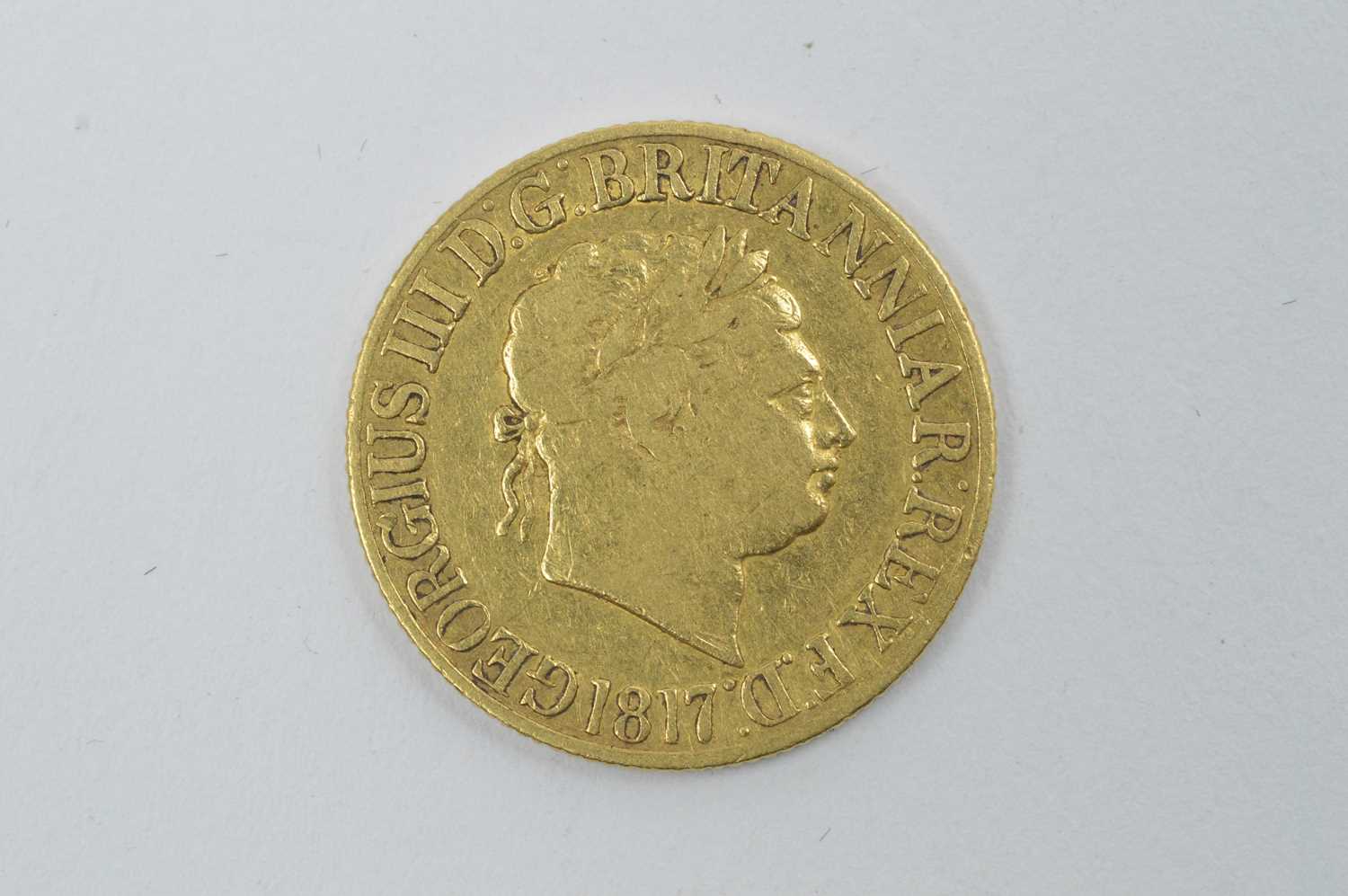 Lot 940 - George III gold sovereign, 1817, type A.