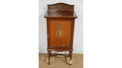 Lot 9 - An attractive Edwardian mahogany and satinwood banded music cabinet.
