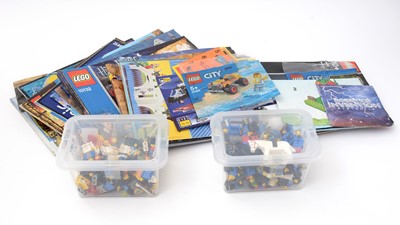Lot 146 - LEGO minifigures, and instruction manuals.