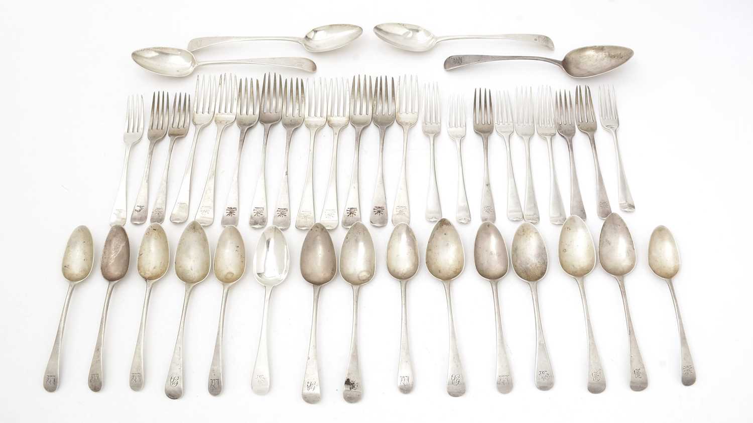 Lot 24 - Mixed antique silver 'Old English' pattern flatware.