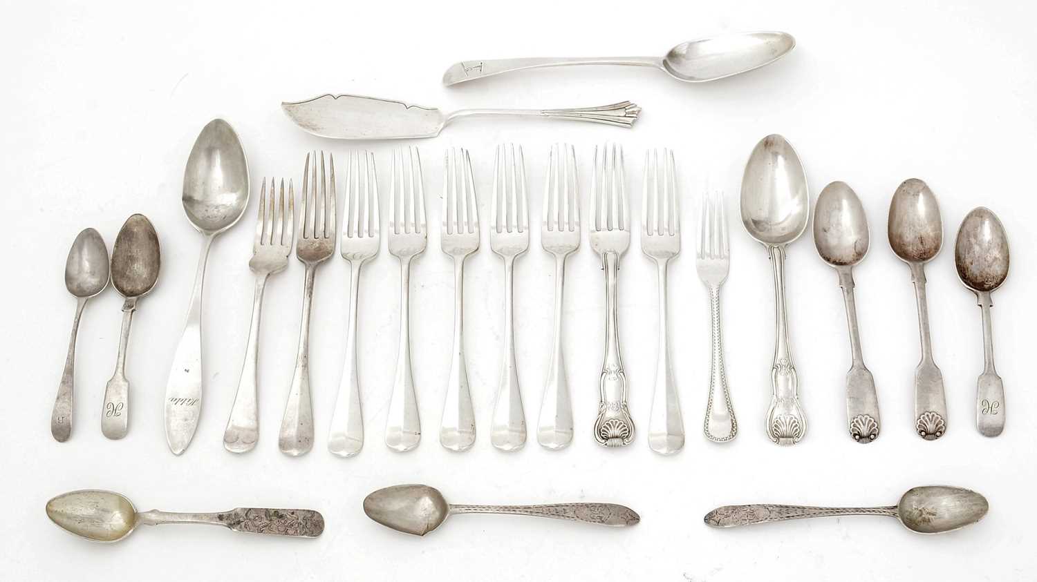 Lot 1 - A small mixed lot of antique silver flatware and cutlery.