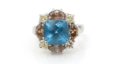 Lot 501 - A topaz and diamond cluster ring