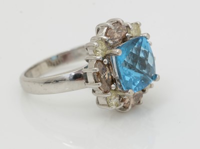 Lot 501 - A topaz and diamond cluster ring