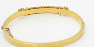 Lot 503 - A Victorian 15ct yellow gold bangle