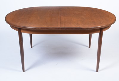 Lot 20 - G-Plan: a mid Century extending dining table; and six mid Century dining chairs.