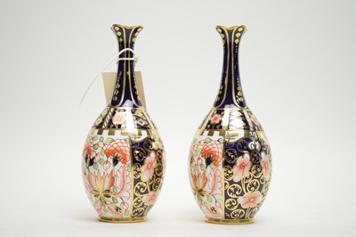 Lot 387 - A pair of Royal Crown Derby ‘Imari’ pattern solifleur vases
