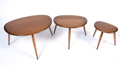 Lot 22 - Ercol: a model 354 beech and elm set of 'Pebble' nesting tables.