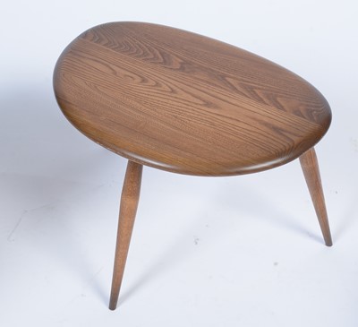 Lot 22 - Ercol: a model 354 beech and elm set of 'Pebble' nesting tables.