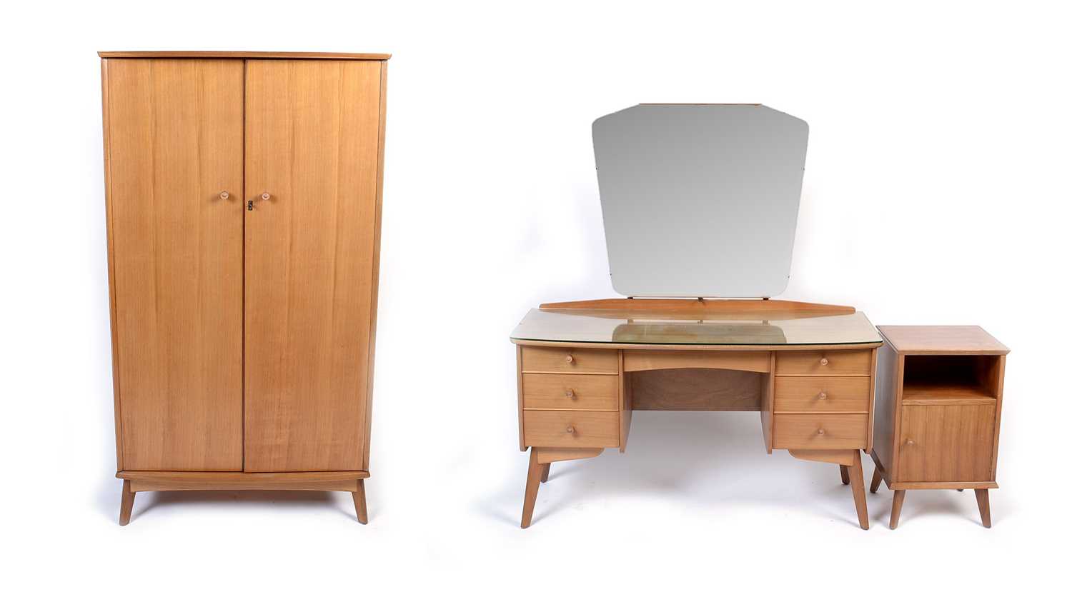 Lot 25 - Alfred Cox for A.C. Furniture: a mid Century teak and walnut bedroom suite.