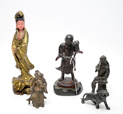 Lot 408 - A selection of oriental figures.