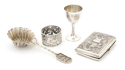 Lot 392 - Chinese silver napkin ring; a cigarette case; sugar sifter ladle; and an egg cup.