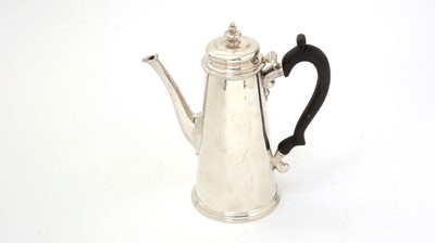 Lot 201 - An early George II silver coffee pot.
