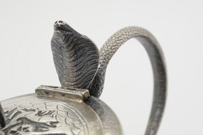 Lot 199 - A late 19th/early 20th Century Indian silver teapot.
