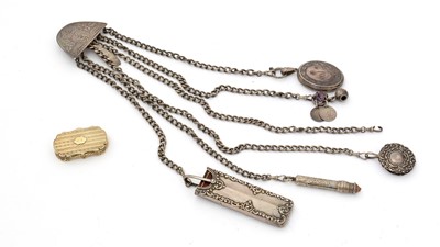 Lot 397 - A Victorian electroplated chatelaine clip with six chains; and a Victorian vinaigrette.