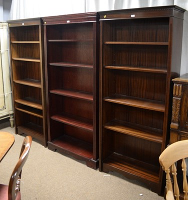 Lot 81 - Three reproduction mahogany open bookcases.