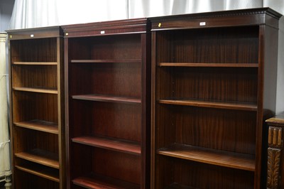 Lot 81 - Three reproduction mahogany open bookcases.