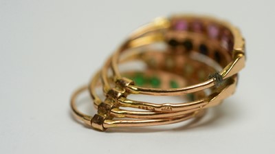 Lot 190 - A four band gem set ring