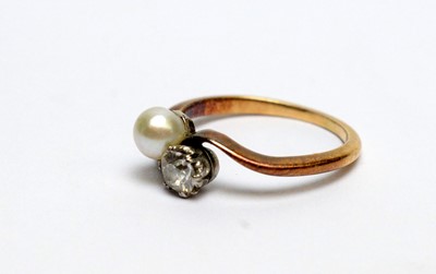Lot 193 - A diamond and pearl ring