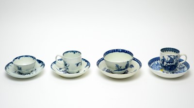 Lot 887 - Four 18th century blue and white cups and saucers.