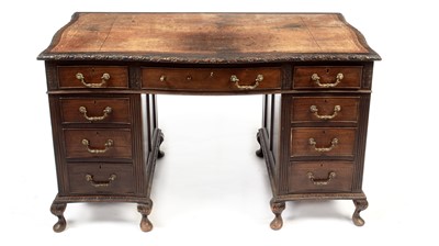 Lot 1164 - Late 19th century carved mahogany serpentine pedestal desk