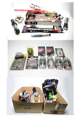 Lot 213 - A selection of boxed and unboxed lightsabers and other weapons.