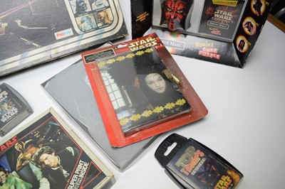 Lot 215 - A selection of Star Wars games and puzzles.