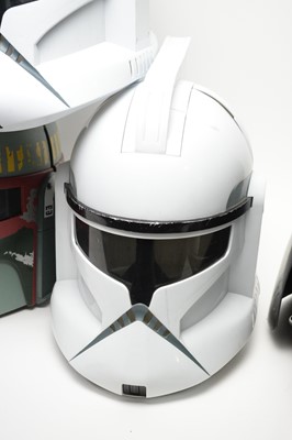 Lot 220 - A selection of Star Wars helmets.