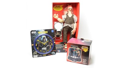 Lot 334 - Star Wars memorabilia, clocks, vehicles, and others.
