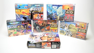 Lot 235 - A selection of Star Wars MicroMachines sets.