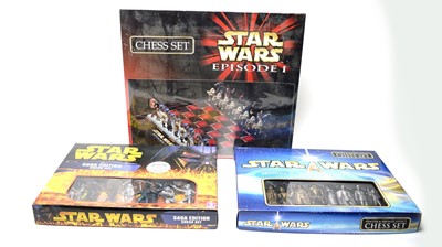 Lot 246 - A selection of Star Wars chess sets.