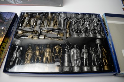 Lot 246 - A selection of Star Wars chess sets.
