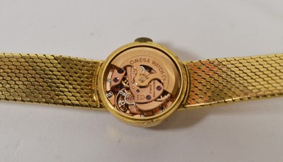 Lot 439 - Omega Ladymatic: an 18ct yellow gold lady's automatic cocktail watch