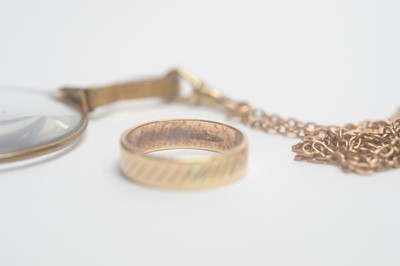 Lot 158 - A gilt lornet; on 9ct yellow gold cable link chain; and 9ct gold ring
