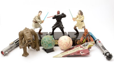 Lot 264 - Star Wars action figures and vehicles.