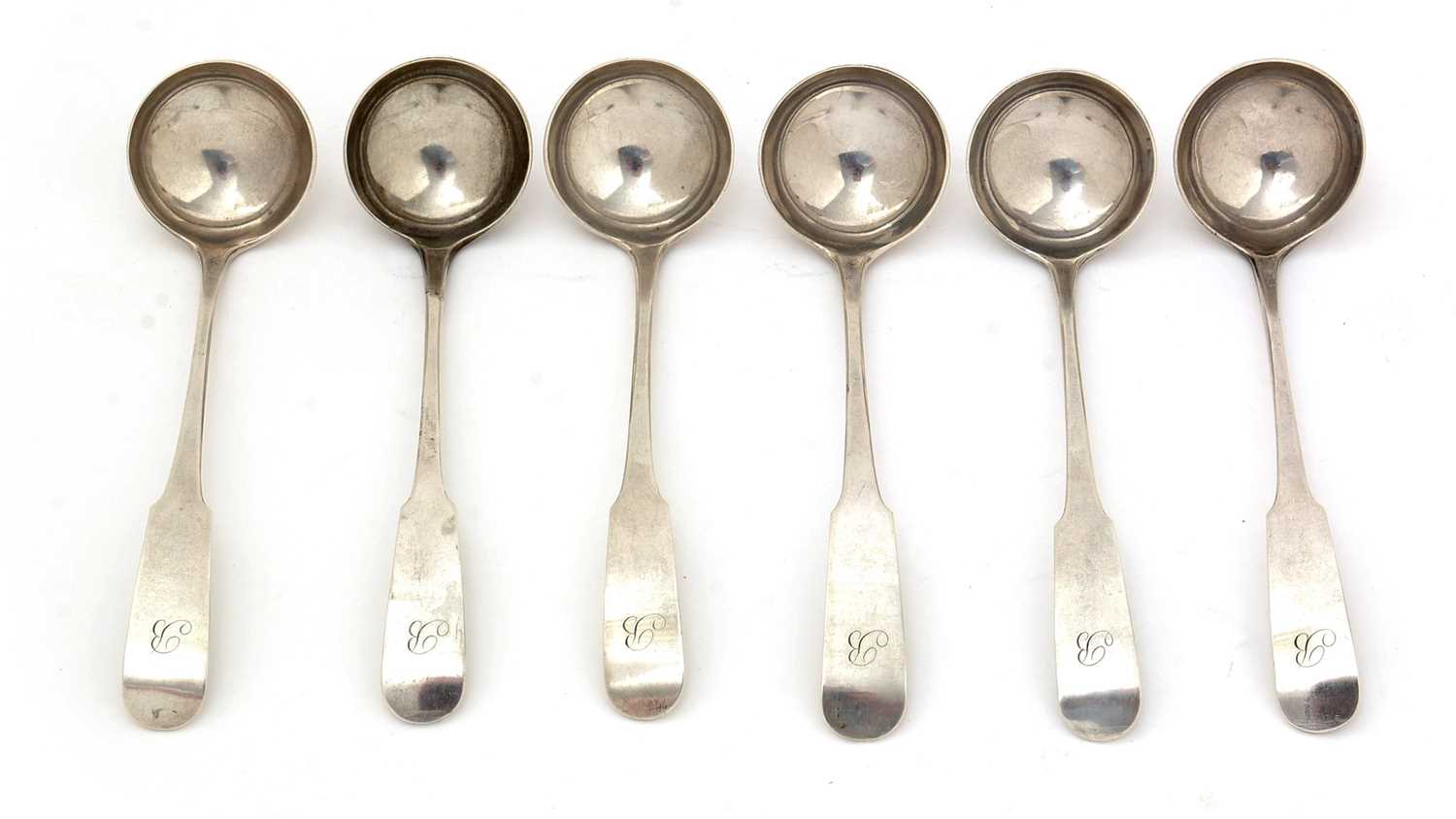 Lot 19 - A set of six George III silver Scottish provincial toddy ladles.