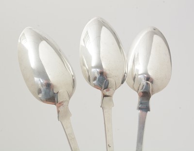 Lot 11 - A set of three William IV silver North Country provincial dessert spoons.