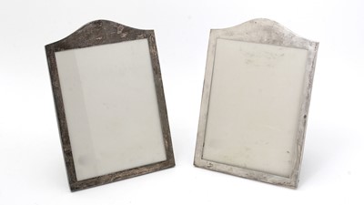 Lot 150 - A pair of early Elizabeth II silver-mounted portrait photograph frames.
