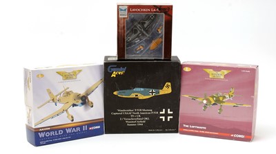 Lot 21 - A group of four boxed die-cast scale-model model airplanes