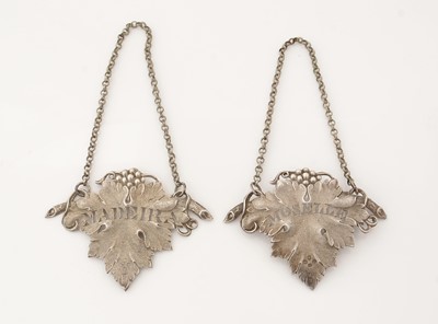 Lot 270 - A matched pair of Victorian silver wine labels.