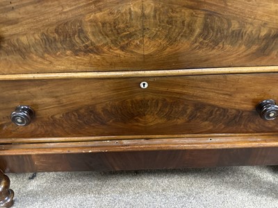 Lot 57 - An early/mid 19th Century mahogany chest.