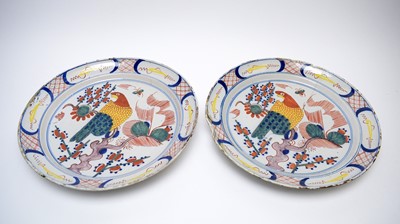 Lot 916 - Pair 18th century Dutch Delft parrot chargers