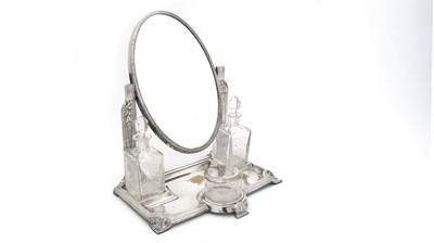Lot 131 - Manner of WMF: an Art Deco plated metal dressing table mirror