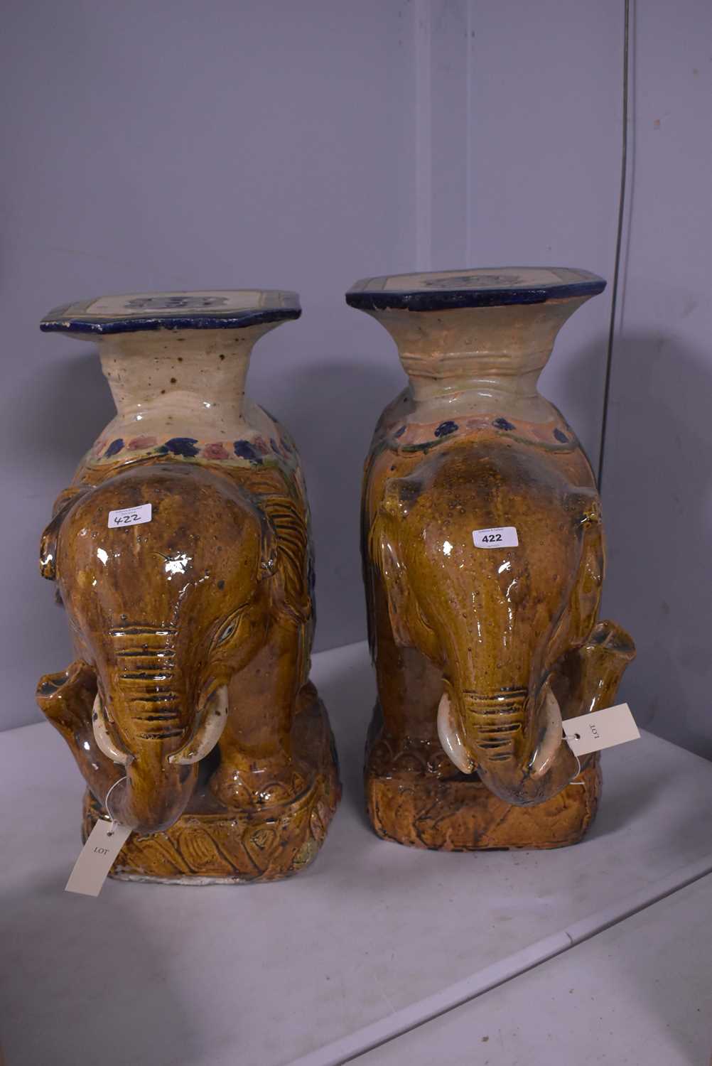 Lot 422 - A pair of Chinese elephant stools.