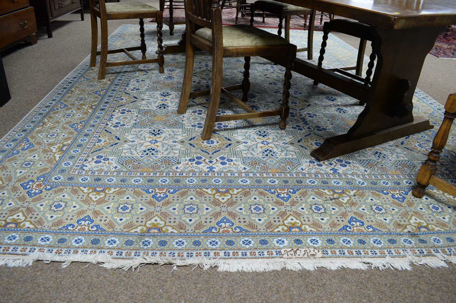 Lot 96 - A Persian carpet.