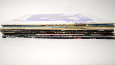 Lot 311 - A selection of mixed rock LPs.