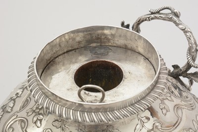 Lot 208 - A George III silver tea urn.