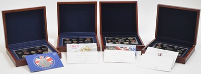 Lot 825 - Royal Mint United Kingdom: four Executive proof collection coin sets.
